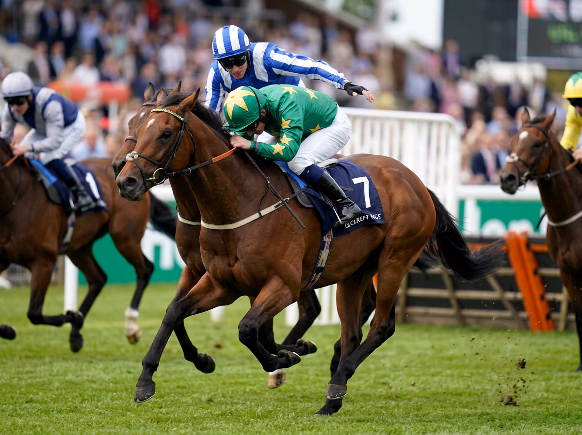 Two jockeys riding while one jockey is chastising the other